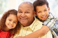 Senior African American man and grandchildren Royalty Free Stock Photo