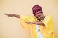 Senior african woman dancing outdoor - Focus on face