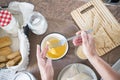 Senior alone at home cooking fish at the kitchen -  very focused indoor - mature and caucasian 60s woman - retired woman Royalty Free Stock Photo