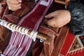 Hands of an arabian female weaver