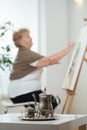 Senior artist painting picture Royalty Free Stock Photo
