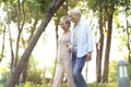 Senior asian couple walking in park