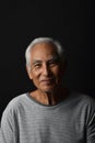 Senior asian old man, Confident and smiling elderly people on black background. Royalty Free Stock Photo