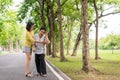 Senior asian woman with faint sitting on floor after falling down,Take care and support concept