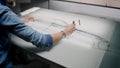 Man drawing car sketch at the light table Royalty Free Stock Photo