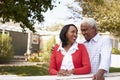 Senior black couple standing outside their new house Royalty Free Stock Photo