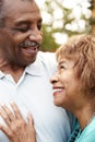 Senior African American  husband and wife embracing, close up, vertical Royalty Free Stock Photo