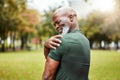 Senior black man with shoulder pain, fitness injury and exercise in the park with muscle ache or inflammation outdoor Royalty Free Stock Photo