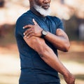 Senior black man, shoulder pain or injury in nature after accident, workout or training. Sports, health or elderly male Royalty Free Stock Photo