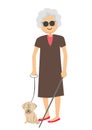 Senior blind woman standing with guide dog Royalty Free Stock Photo