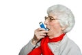 Senior with bronchial inhaler