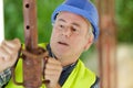 Senior builder working with pipes Royalty Free Stock Photo