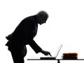 Senior business man computing typing silhouette Royalty Free Stock Photo