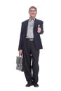 senior business man with a leather briefcase looking at you. Royalty Free Stock Photo