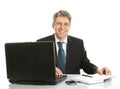 Senior business man working on laptop Royalty Free Stock Photo