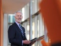 Senior business man working on tablet computer Royalty Free Stock Photo