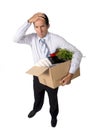 senior businessman carrying office box fired from work sad desperate depressed after loosing job