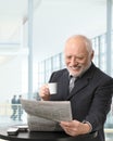 Senior businessman on coffee break