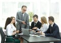 Senior businessman discussing with business team to work issues Royalty Free Stock Photo