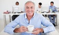 Senior businessman drinking a coffee Royalty Free Stock Photo