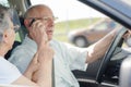 Senior businessman driving while using phone Royalty Free Stock Photo