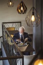 Senior businessman eating lunch in restaurant Royalty Free Stock Photo