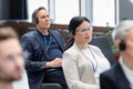 Senior businessman in headset holding laptop Royalty Free Stock Photo