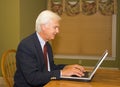 Senior Businessman on Laptop