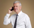 Senior businessman with mobile phone Royalty Free Stock Photo