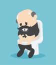 Senior businessman sits on toilet bowl, diarrhea