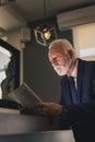 Middle-aged businessman reading newspaper Royalty Free Stock Photo