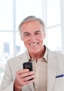 Senior businessman using a mobile phone Royalty Free Stock Photo