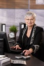 Senior businesswoman sitting in office Royalty Free Stock Photo
