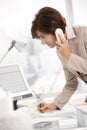 Senior businesswoman working in office Royalty Free Stock Photo