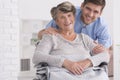 Senior care assistant with disabled woman Royalty Free Stock Photo