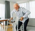 senior care help walker assistence retirement home nursing elderly man hospital clinic home disability disabled alone Royalty Free Stock Photo
