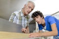 senior carpenter training apprentice Royalty Free Stock Photo