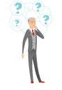 Senior caucasian businessman under question marks. Royalty Free Stock Photo