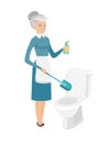 Senior caucasian cleaner cleaning toilet bowl.