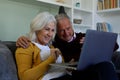 Senior caucasian couple having a video chat on laptop at home Royalty Free Stock Photo