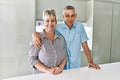 Senior caucasian couple smiling happy and hugging standing at the kitchen Royalty Free Stock Photo