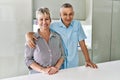 Senior caucasian couple smiling happy standing at the kitchen Royalty Free Stock Photo