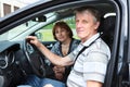 Senior Caucasian male and woman sitting in land vehicle Royalty Free Stock Photo