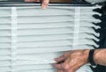 Senior man inserting a new air filter in a HVAC Furnace Royalty Free Stock Photo