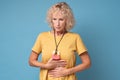 Senior caucasian woman suffering from stomach pain and indigestion Royalty Free Stock Photo