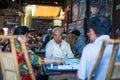 Senior chinese people playing mahjong in an ancient tearoom Royalty Free Stock Photo