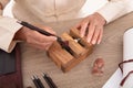 Senior Chinese seal carving artist at work Royalty Free Stock Photo