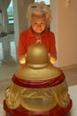 Senior Chinese Woman Praying To Statue Of Buddha Royalty Free Stock Photo