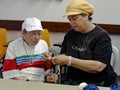 Senior Citizen Learning to Crochet