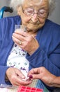 Senior Citizen taking Pill Royalty Free Stock Photo